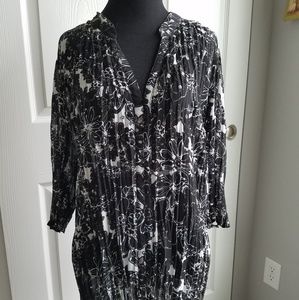 Sequin black and white blouse.